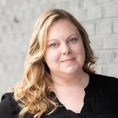 Portrait of Michelle, a professional stylist at Salon Ciseaux, showcasing their expertise and style.