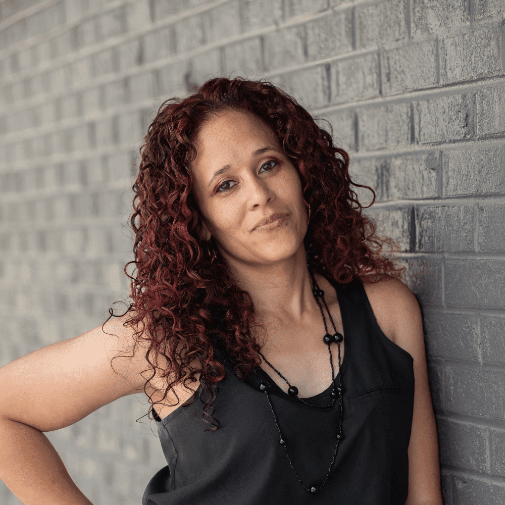 Portrait of Samantha, a professional stylist at Salon Ciseaux, showcasing their expertise and style.